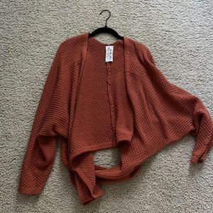 Slouchy brown sweater by Sadie and sage. Boutique wear.